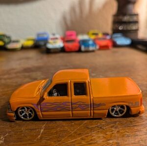2000 Chevrolet Silverado Jada Orange Toy Truck with Purple Flames